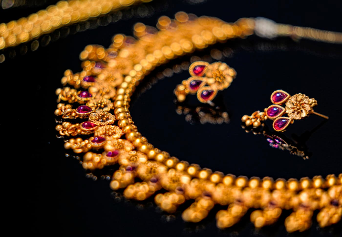 A ruby and gold necklace
