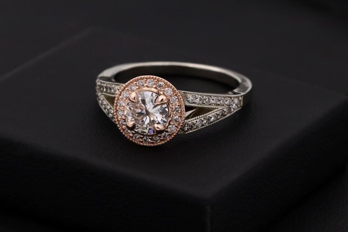 Diamond rings presented in a dark jewellery box