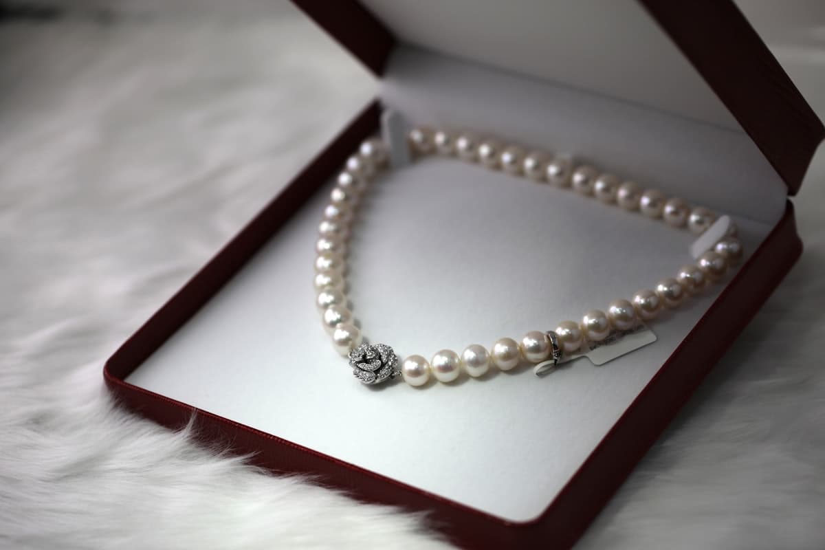 A strand of pearls in a jewellery box